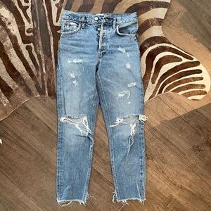 AGOLDE distressed denim jeans.